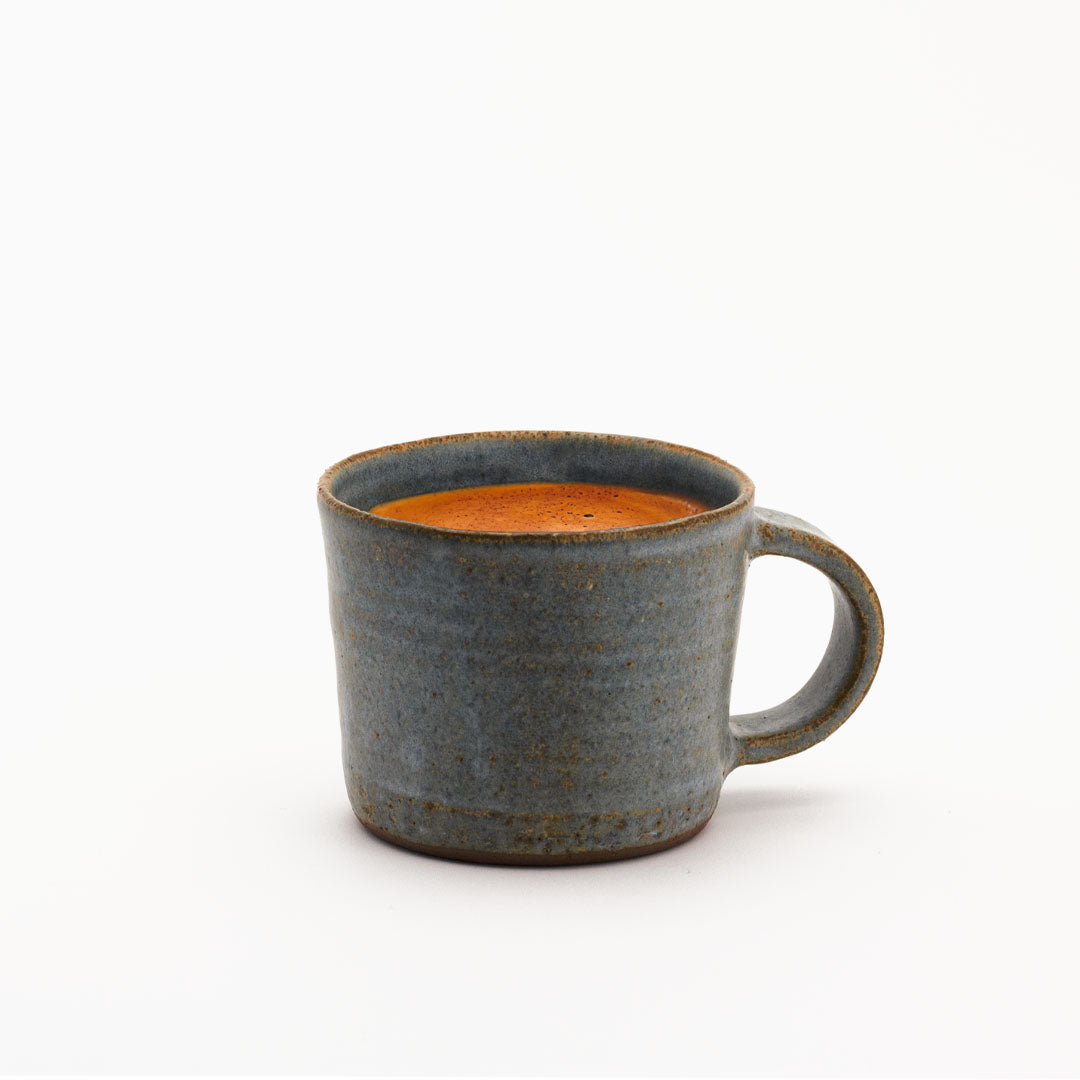 Hover image of a Blå collection cup filled with coffee.