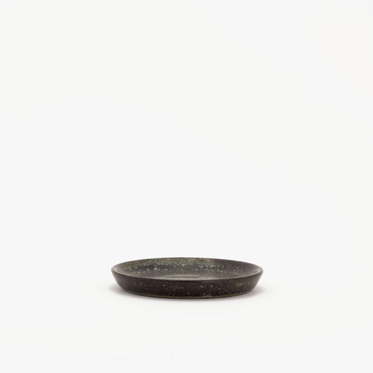 Image of a Vulkan collection tea plate.